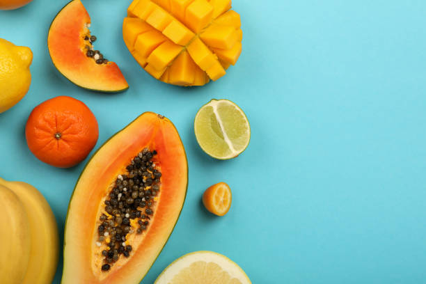 istock Exotic fruits set on blue background, space for text 1495108010