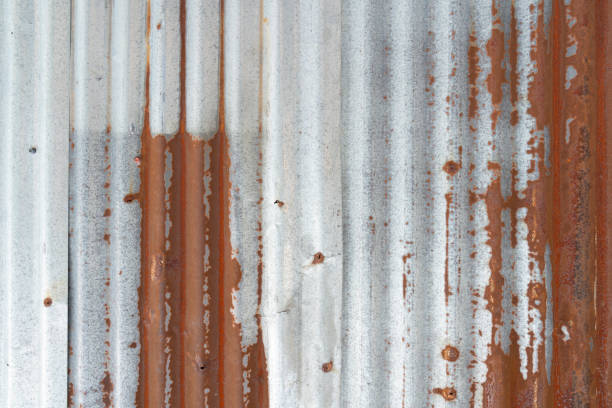 istock The Rusty zinc sheet texture and background, Reddish brown stain on metallic silver 1495108307
