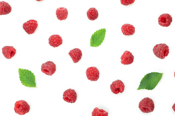 istock Flat lay composition with red juicy raspberry, isolated on white background 1495114419