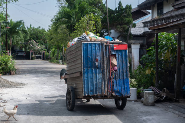 istock garbage collection carts that function to collect household waste in residential areas 1495119116