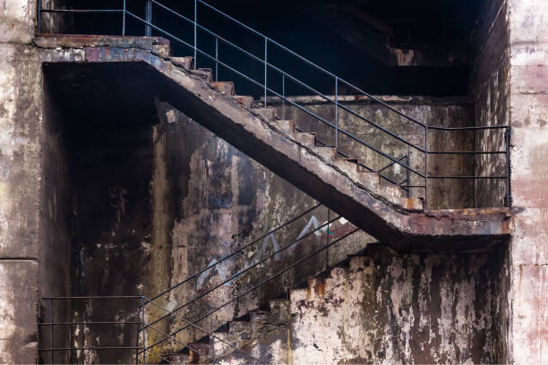 istock Part of a dry dock wall with a concrete staircase. 1495124966