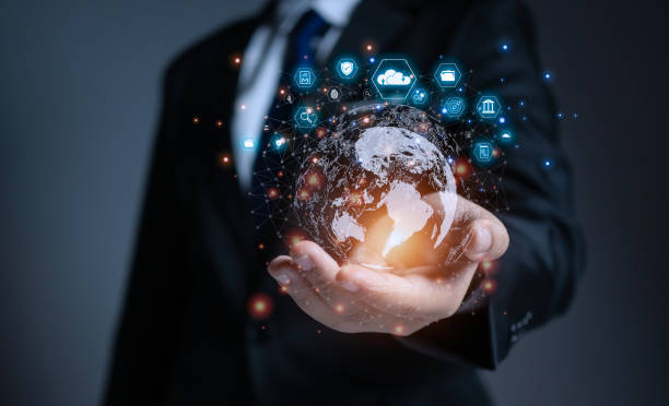istock businessman holding globe with virtual Global Internet connection. global internet connection application technology and digital marketing, big data, Financial and banking, Digital link tech. 1495125728