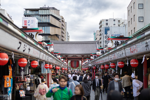 Tokyo, Japan - May 8, 2023 : View of the crowded and cloudy sky at Nakamise shopping street near Sensoji Temple located in Asakusa