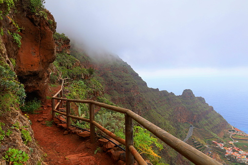 The green hilly north of Gomera, Canary Islands: Panoramic view of the village of Agulo, Spain