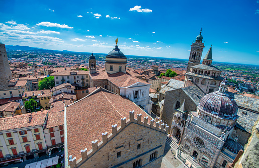 Medieval streets and buildings of Bergamo Alta on a sunny summer day, Italy.