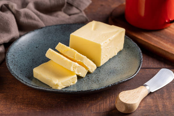 istock Fresh butter from the farm on the table. Butter tablet. 1495137559