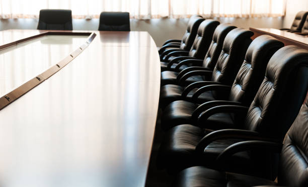 istock Conference table and chairs in modern meeting room 1495139613