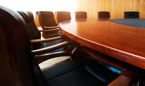 Conference table and chairs in modern meeting room Conference table and chairs in modern meeting room round wooden chair stock pictures, royalty-free photos & images
