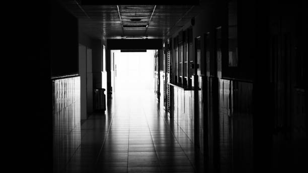 istock Dark long corridor in hospital 1495139656