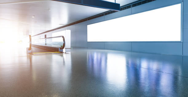 istock Blank billboard and escalator at a international airport 1495140000