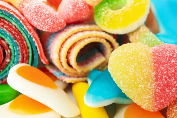 istock Gummy candies all over background, close up 1495143649