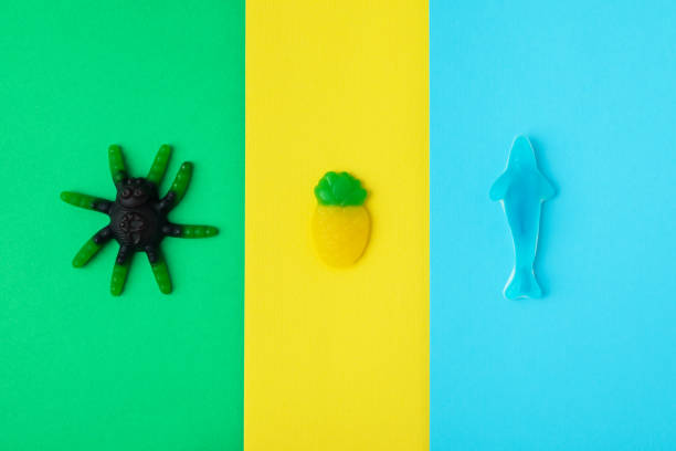 istock Tasty gummy candies on three tone background 1495143672
