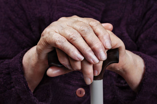 istock Hands of an elderly woman on a cane 1495144185