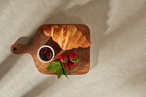 Top View Of Croissant Strawberry With Empty Space