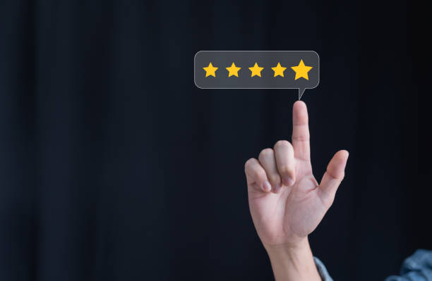 istock Customers point their fingers at a 5-star rating. Customer service concept, service evaluation, satisfaction rating. 1495148899