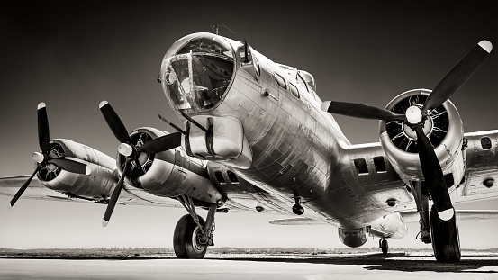 Vintage Douglas DC-3 propellor airplane ready for take off at the runway of an empty airfield. Image with a retro look.