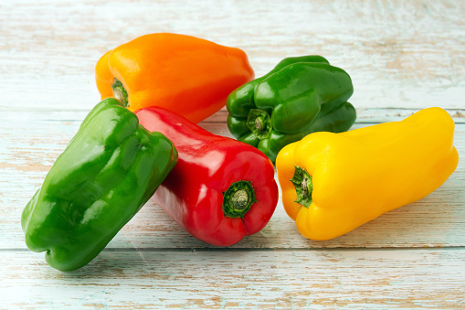 red, yellow, orange and green peppers