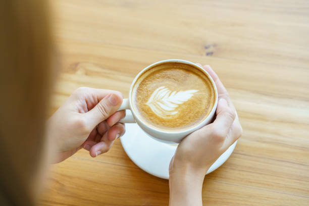 istock Woman drinking a coffee in coffee shop. 1495158723