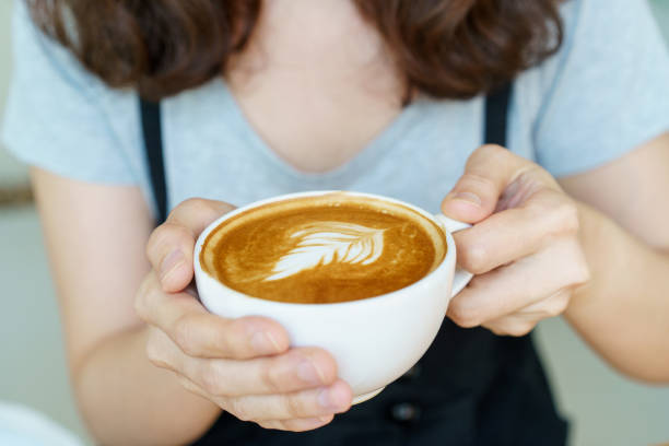 istock Woman drinking a coffee in coffee shop. 1495158727