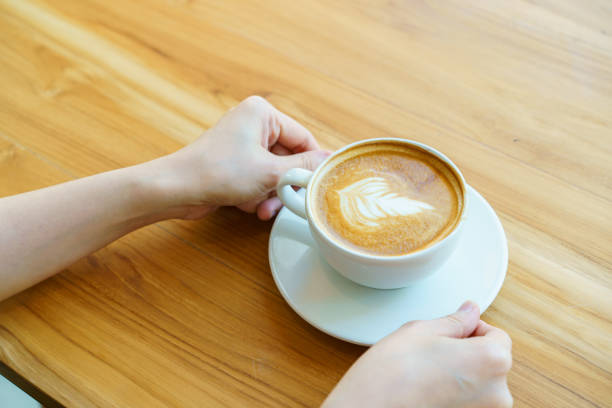istock Woman drinking a coffee in coffee shop. 1495158746