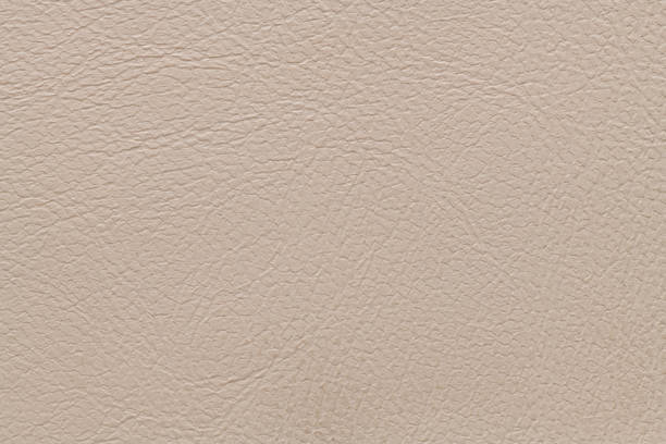 istock Beige artificial leather with large texture. Artificial skin. Close-up. Background. Texture. 1495161668