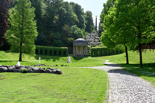 Kleve, Germany, May 17, 2023 - Historical garden of the amphitheater with the statue of the Palas Athene at the Springenberg in Kleve, Lower Rhine area.