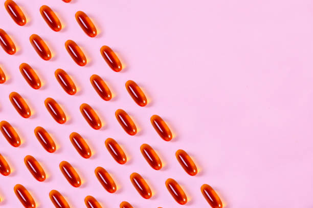 istock Fish Oil Capsules On a Pink Background. 1495163002