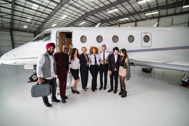 istock Cabin Crew With Diverse Group Of Passengers 1495164511
