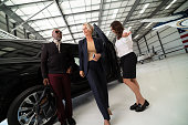 Air Hostess Welcomes Elegant Venture Capitalist and Fashionable Businessman