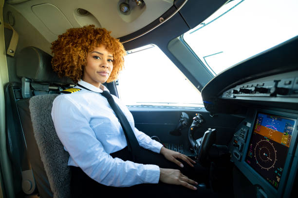 istock Pilot With Curly Hair Looking At Camera 1495164589