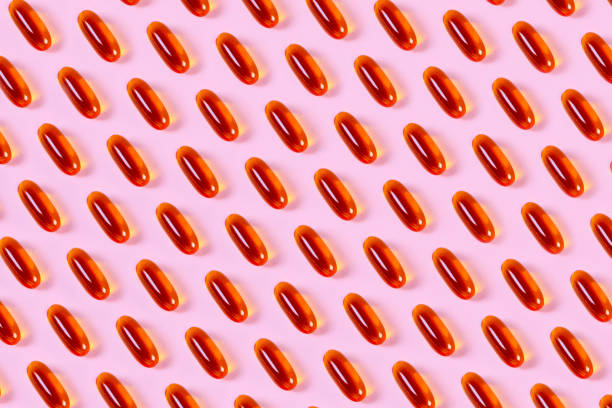 istock Fish Oil Capsules On a Pink Background. 1495164640