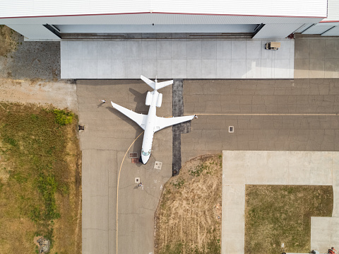 An aerial shot of a private jet turning on the runway.

This drone shot was taken with full permission and co-operation of the airport staff and the pilots of the aircraft.