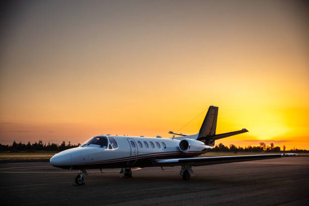 istock Side View Of Private Jet At Sunset 1495164852