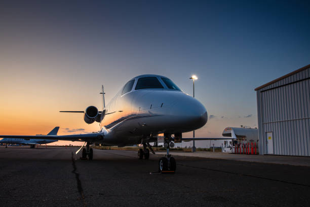 istock Private Jet On The Runway In Front Of Hangar 1495164860
