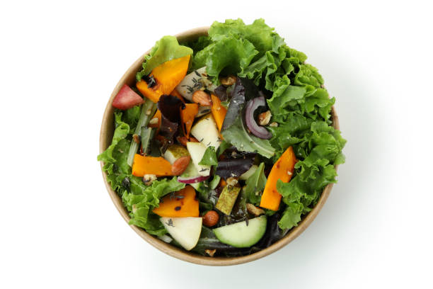 istock Cardboard bowl with pumpkin salad isolated on white background 1495165609
