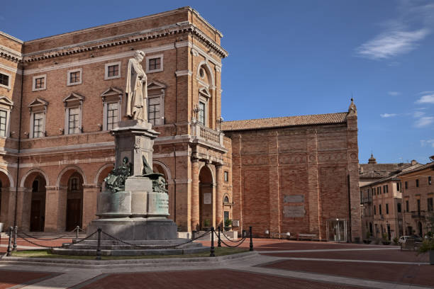 Recanati, Marche, Italy: monument of the great poet Giacomo Leopardi, erected in 1898, in the main square of the town Recanati, Marche, Italy: monument of the great poet Giacomo Leopardi, erected in 1898, in the main square of the town macerata italy stock pictures, royalty-free photos & images
