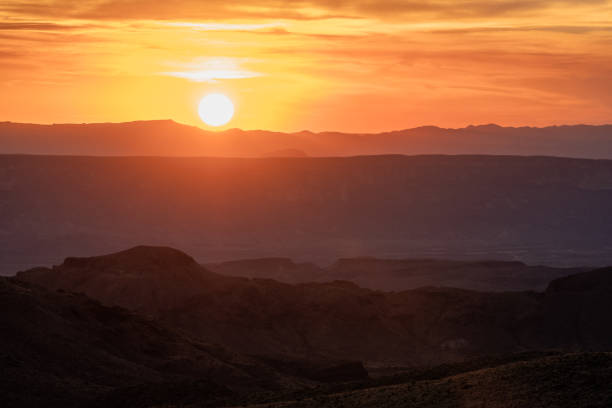 istock Orange Skies Surround Sun as it Sets over Big Bend 1495168540