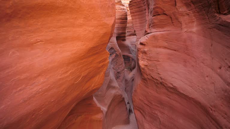 Motion In Mysterious Cave In Slot Canyon With Red Orange Smooth Rocks Formation