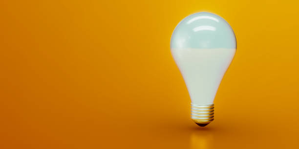istock 3D Render of Light Bulb on Orange Yellow Background 1495173106