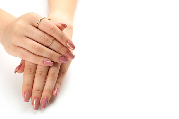 istock Beautiful female hands isolated on white background 1495173704