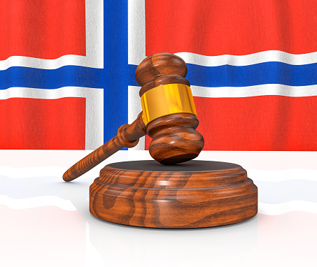 Norwegian Law Concept - Norwegian Flag and Judge's Gavel