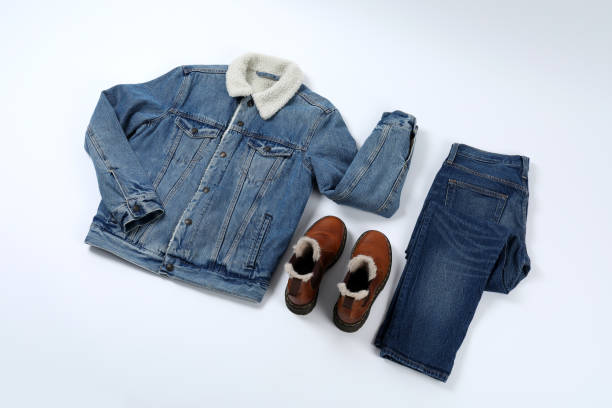 istock Concept of winter clothes on white background 1495176446