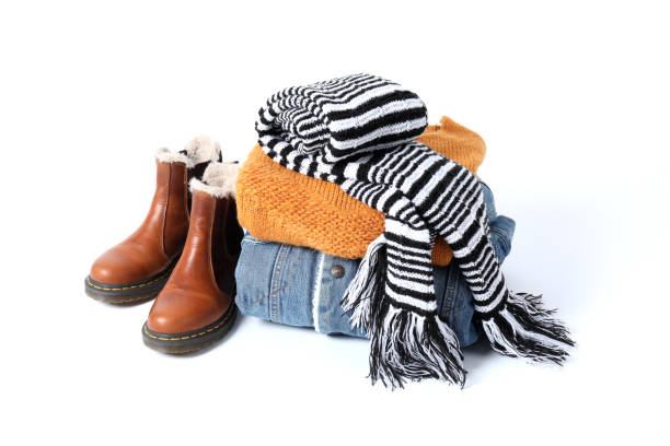 istock Concept of winter clothes isolated on white background 1495177568