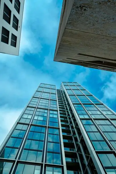 A modern skyscraper with a contemporary glass facade