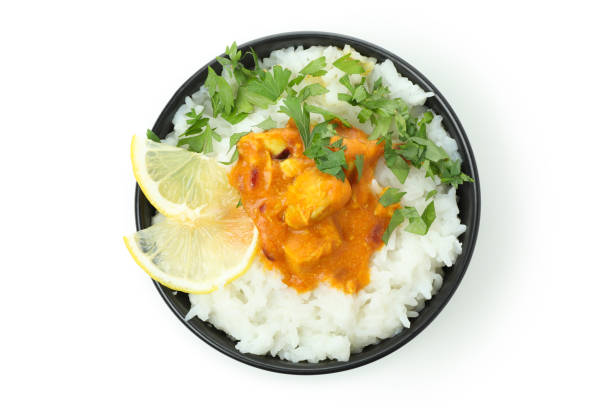 istock Chicken tikka in bowl isolated on white background 1495179136