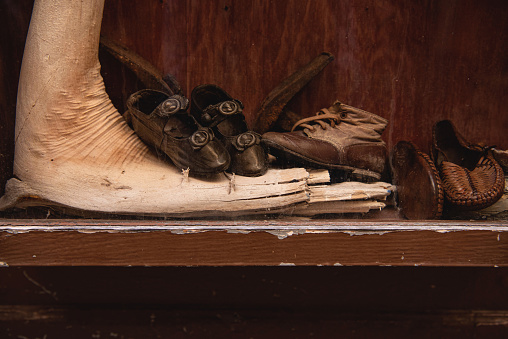 Old Fashion Shoes Displayed in Wooden Showcase