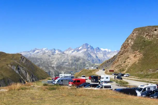 Panorama view with mountain Finsteraarhorn and Furka Pass parking lot in the Swiss Alps, Switzerland