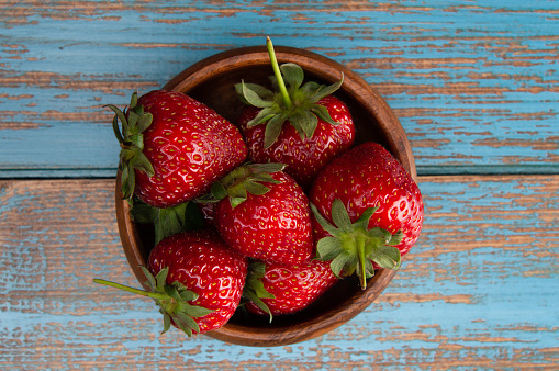 Fresh strawberries in a bowl.