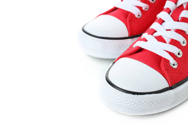 istock Pair of red sneakers isolated on white background 1495184088