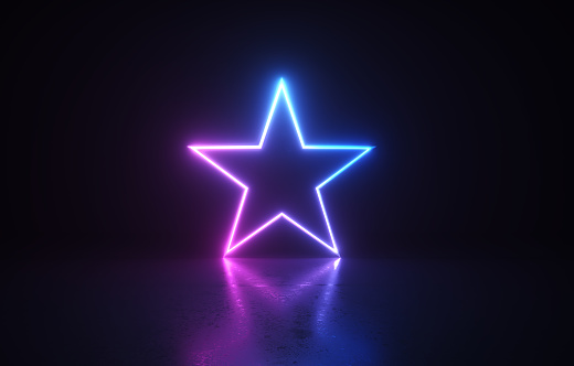 Glowing star shape before dark background. Horizontal composition.